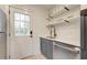 Modern kitchen with stainless steel appliances, gray cabinets, and a convenient exterior door at 2317 Kent Ave, North Charleston, SC 29405