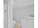 Clean white bathroom featuring a shower and vanity with modern fixtures at 2516 Willbrook Ln, Mount Pleasant, SC 29466