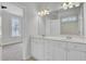 Bathroom featuring double vanity sinks and neutral paint and tile at 2516 Willbrook Ln, Mount Pleasant, SC 29466