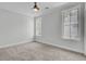 Bright bedroom featuring neutral paint, carpet and two windows at 2516 Willbrook Ln, Mount Pleasant, SC 29466