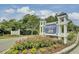 Rivertowne on the Wando community entrance sign with colorful landscaping at 2516 Willbrook Ln, Mount Pleasant, SC 29466