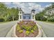 Rivertowne on the Wando community entrance sign with colorful landscaping at 2516 Willbrook Ln, Mount Pleasant, SC 29466