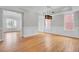 Spacious living room featuring hardwood floors, wainscoting, and natural light at 2516 Willbrook Ln, Mount Pleasant, SC 29466