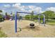 Playground with blue metal swings, a tire swing, and slides at the community park at 2516 Willbrook Ln, Mount Pleasant, SC 29466