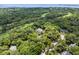Majestic aerial view highlighting the lush green landscape with scattered homes and a meticulously maintained golf course at 2653 Seabrook Island Rd, Seabrook Island, SC 29455