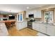 Bright kitchen featuring white cabinets, stainless steel appliances, and granite countertops at 2653 Seabrook Island Rd, Seabrook Island, SC 29455