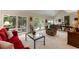 Bright and airy living room with lots of natural light, comfortable seating, and an adjacent dining area at 2653 Seabrook Island Rd, Seabrook Island, SC 29455