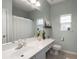 Well-lit bathroom featuring an extended vanity area and stylish decor at 2845 August Rd, Johns Island, SC 29455
