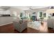 Bright living room with hardwood floors, natural light, and comfortable furnishings at 2845 August Rd, Johns Island, SC 29455
