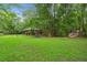 Park features a covered picnic area and bridge surrounded by lush greenery, perfect for outdoor gatherings at 2845 August Rd, Johns Island, SC 29455