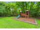 Playground features swings, a slide, and a climbing structure for outdoor fun at 2845 August Rd, Johns Island, SC 29455