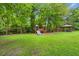 Community playground includes swings, a slide, a climbing structure, and a covered picnic area at 2845 August Rd, Johns Island, SC 29455
