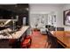 Bright kitchen with granite countertops, modern appliances, and an open view to the living room at 301 Broad St # 1, Charleston, SC 29401