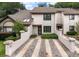 Charming townhome with striped driveway and tasteful landscaping at 321 Lapwing Ln, Mount Pleasant, SC 29464