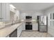 Updated kitchen with white cabinets and stainless steel appliances at 321 Lapwing Ln, Mount Pleasant, SC 29464