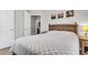 Bedroom with a bed and bedside table, leading into a bathroom at 348 Spindlewood Way, Charleston, SC 29414