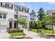 Beautiful townhome with an attached garage and well-maintained lawn, perfect for comfortable living at 348 Spindlewood Way, Charleston, SC 29414