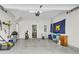 Spacious two-car garage with an epoxy floor, ample storage, and convenient access to the home at 348 Spindlewood Way, Charleston, SC 29414