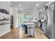 Bright kitchen with stainless steel appliances and a kitchen island with seating at 348 Spindlewood Way, Charleston, SC 29414