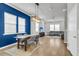 Living room with a large window and blue accent wall at 348 Spindlewood Way, Charleston, SC 29414