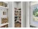 Walk-in pantry featuring metal shelves and ample storage space at 348 Spindlewood Way, Charleston, SC 29414