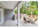 Outdoor patio area featuring pavers, neutral siding, a covered area, and a view of the fenced backyard at 348 Spindlewood Way, Charleston, SC 29414