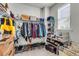 Walk-in closet with shelving, hanging racks, a window and room for storage at 348 Spindlewood Way, Charleston, SC 29414