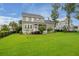 Expansive backyard featuring a well-manicured lawn and mature landscaping, providing privacy and scenic views at 3739 Goodwater St, Mount Pleasant, SC 29466