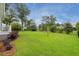Beautifully landscaped backyard with lush green lawn and privacy fence creating a serene outdoor space at 3739 Goodwater St, Mount Pleasant, SC 29466