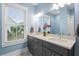 Elegant bathroom features dual sinks, quartz countertops, and stylish fixtures at 3739 Goodwater St, Mount Pleasant, SC 29466