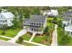 Charming two-story home featuring a welcoming front porch, lush landscaping, and a neatly manicured lawn at 3739 Goodwater St, Mount Pleasant, SC 29466