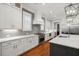 Bright kitchen features white cabinetry, quartz countertops, stainless appliances and light gray subway tile backsplash at 3739 Goodwater St, Mount Pleasant, SC 29466