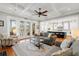 Spacious living room with views into the kitchen and breakfast nook, with access to outdoor living at 3739 Goodwater St, Mount Pleasant, SC 29466