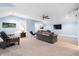 Spacious living room featuring neutral carpet, comfortable seating, and lots of natural light at 3739 Goodwater St, Mount Pleasant, SC 29466