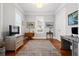 Bright office features hardwood floors, natural light, and a comfortable workspace at 3739 Goodwater St, Mount Pleasant, SC 29466