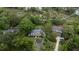 Stunning aerial view of property featuring a spacious home, lush greenery, and serene waterfront access at 375 Seewee Cir, Mount Pleasant, SC 29464