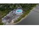 Scenic aerial view of a yacht club with a pool, marina, and boat storage on the waterfront at 375 Seewee Cir, Mount Pleasant, SC 29464