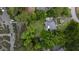 Aerial view showcases the property's private waterfront access and expansive green lawn at 375 Seewee Cir, Mount Pleasant, SC 29464