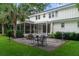 Beautiful backyard patio with outdoor seating and grill, perfect for entertaining guests at 375 Seewee Cir, Mount Pleasant, SC 29464
