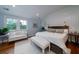 Bright and airy bedroom with white walls, wood floors, and stylish furnishings at 375 Seewee Cir, Mount Pleasant, SC 29464