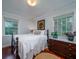 Inviting bedroom with hardwood floors, vintage furniture, and ample natural light at 375 Seewee Cir, Mount Pleasant, SC 29464