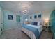 Bedroom with wainscoting, white trim, light blue walls, and carpeted floor at 375 Seewee Cir, Mount Pleasant, SC 29464