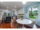 Bright kitchen with eat in breakfast nook, granite island, and white cabinets at 375 Seewee Cir, Mount Pleasant, SC 29464