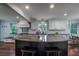 Spacious kitchen with granite island, white cabinets, and stainless steel appliances at 375 Seewee Cir, Mount Pleasant, SC 29464