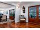 Spacious living room featuring hardwood floors, white trim, and decorative clock at 375 Seewee Cir, Mount Pleasant, SC 29464