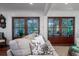 Comfortable living room with wood doors leading to the outdoors at 375 Seewee Cir, Mount Pleasant, SC 29464