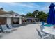 Inviting pool area with comfortable lounge chairs, shaded seating, and a well-maintained deck at 375 Seewee Cir, Mount Pleasant, SC 29464