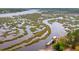 Aerial view of community boat docks and waterways, highlighting natural beauty at 3871 Sawyers Island Dr, Mount Pleasant, SC 29466