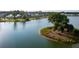 Beautiful aerial view of waterfront homes surrounding a calm lake and lush green common areas at 3871 Sawyers Island Dr, Mount Pleasant, SC 29466