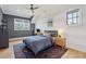 Bedroom with hardwood floors, baseball theme, blue accent wall, and a ceiling fan at 3871 Sawyers Island Dr, Mount Pleasant, SC 29466